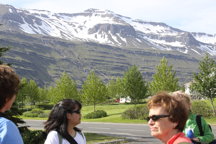 Foreground: people; background: mountains