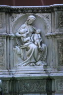 Mary suckling the infant Jesus, and cradling John in her other arm