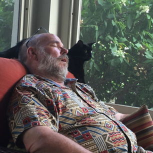 Mark, sleeping, with cat