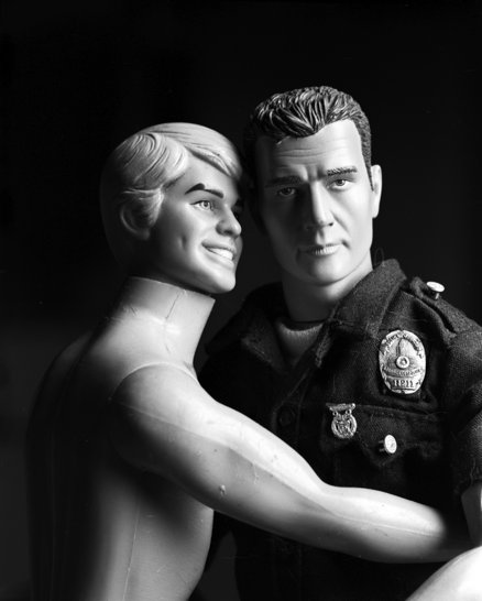 Ken and Officer West, close together