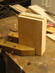 four boards clamped together for planing