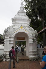 ornate all-white ceremonial gate