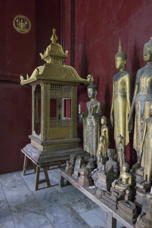 unknown objectstanding figurines by a giant incense burner