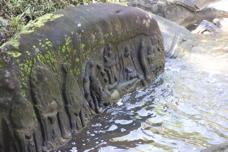 sculpture in stream