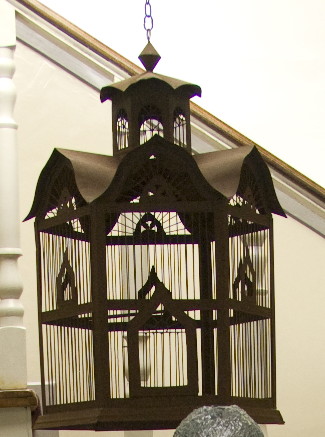 Birdcage in a hotel courtyard