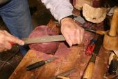 rasping to round the piece