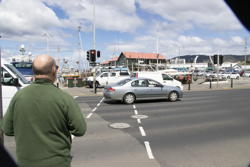 Mark, waiting for a light, harbor on the other side of the street