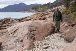 Mark among rocks and pebbles